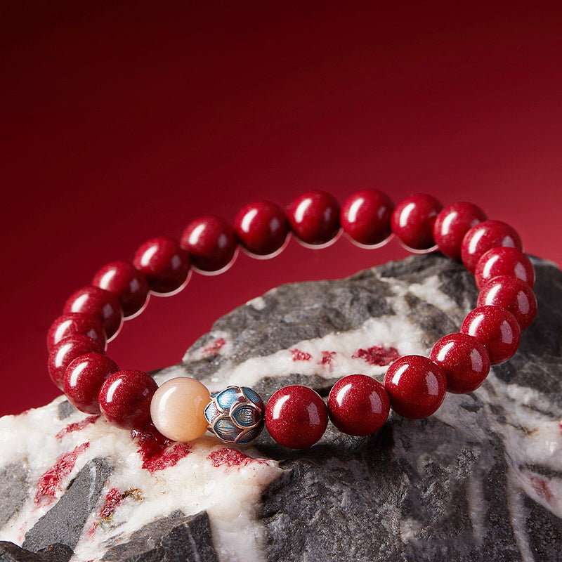 Handmade Cinnabar Bracelet with Lotus and Sunstone - Enamel Lotus Charm for Serenity and Good Fortune