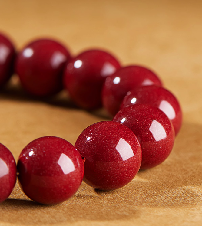 Handmade Cinnabar Bracelet with Lotus and Sunstone - Enamel Lotus Charm for Serenity and Good Fortune