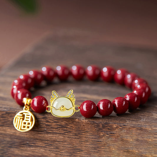 Cinnabar Bracelet with Dragon Jade, 14K Gold Fortune Charm, and Gold Accents – Strength, Luck, and Prosperity