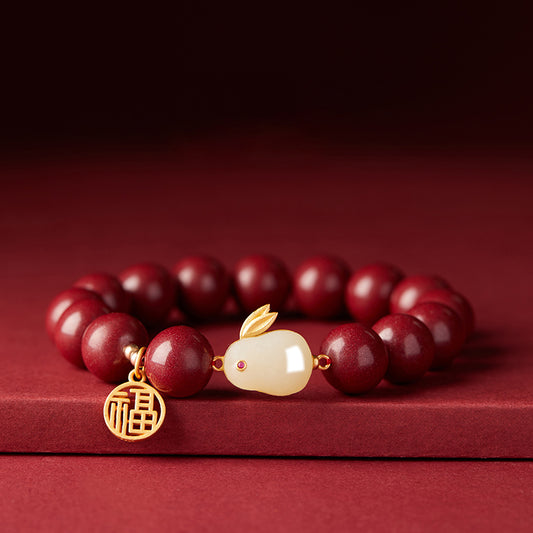 Cinnabar Bracelet with Jade Rabbit, 14K Gold Fortune Charm, and Gold Accents – Luck, Health, and Prosperity