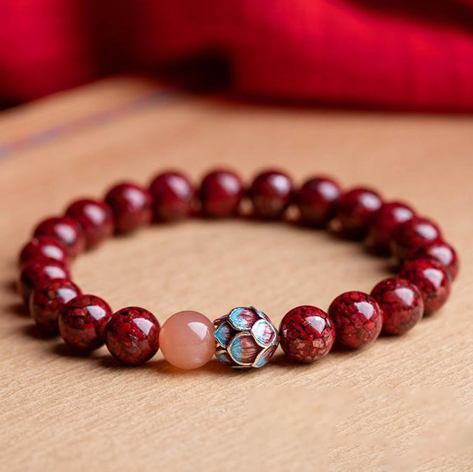 Cinnabar Crystal Bracelet with Enamel Lotus & Sunstone – Abundance, Harmony, and Positive Energy