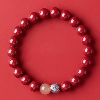 Handmade Cinnabar Bracelet with Lotus and Sunstone - Enamel Lotus Charm for Serenity and Good Fortune