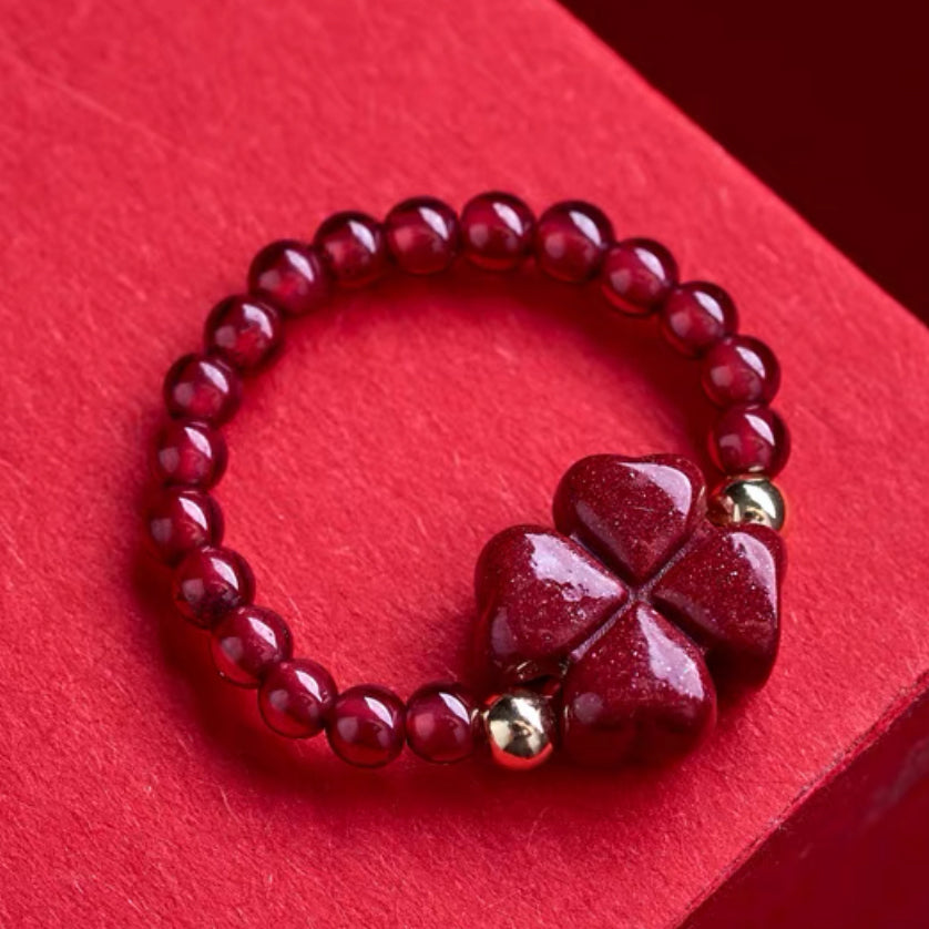 Cinnabar Four-Leaf Clover Ring with Garnet and 14K Gold Accents – Luck, Prosperity, and Devotion